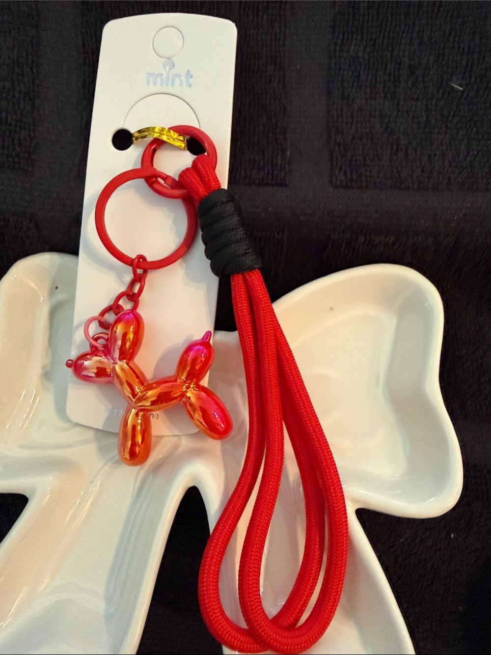 Mint Red Tassel Keychain with Iridescent Orange-Pink Balloon Dog Charm